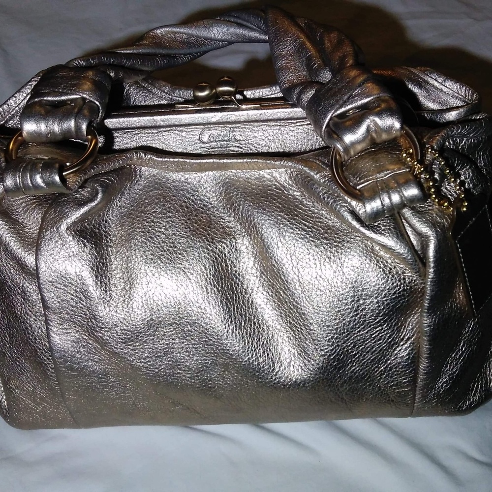 Rose gold coach purse
